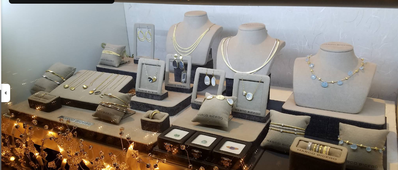 Display case of designer fine jewelry at Meadowlark